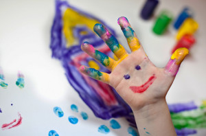 Little Children Hands doing Fingerpainting